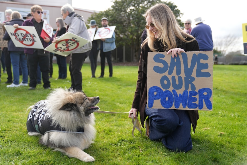 Anti-data centre protester with dog.