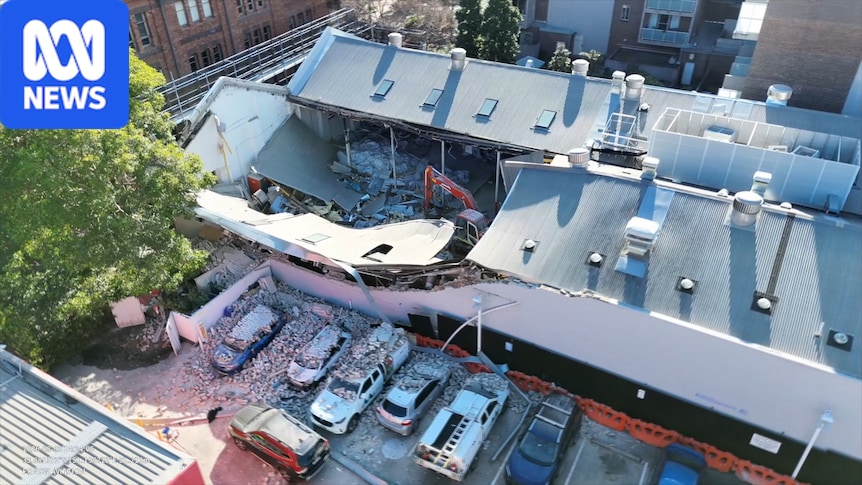 Two seriously injured in Sydney building collapse next to petrol station