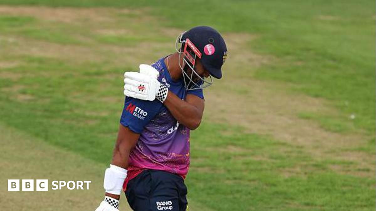 Emilio Gay clutching his right shoulder during Durham's match with Middlesex