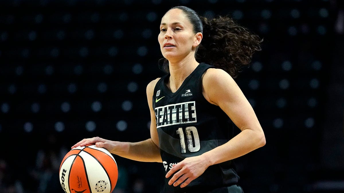 FILE - Seattle Storm's Sue Bird dribbles in the first half of a WNBA second round playoff basketball game against the Phoenix Mercury, Sunday, Sept. 26, 2021, in Everett, Wash. Sue Bird officially re-signed Friday, Feb. 18, 2022, with the Seattle Storm, her only WNBA team, in what is expected to be her final season.