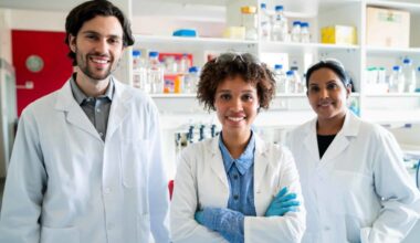 Happy healthcare workers in a lab.