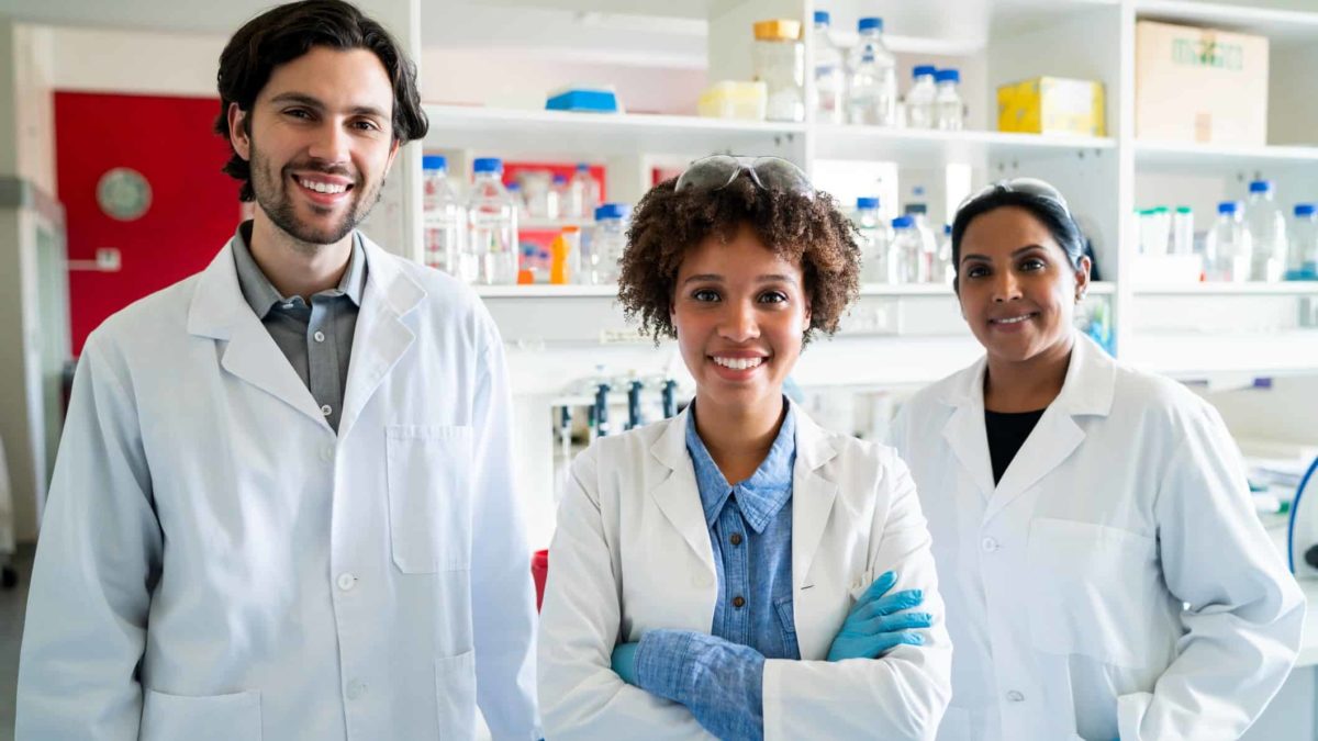 Happy healthcare workers in a lab.