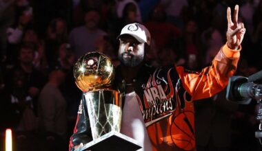 MIAMI, FLORIDA - FEBRUARY 03: Dwyane Wade carries the Larry O'Brien trophy during a ceremony to mark the 20th anniversary of the Miami Heat's 2006 NBA Finals title at halftime of a game between the Heat and the Atlanta Hawks at Kaseya Center on February 03, 2026 in Miami, Florida. (Photo by Megan Briggs/Getty Images)