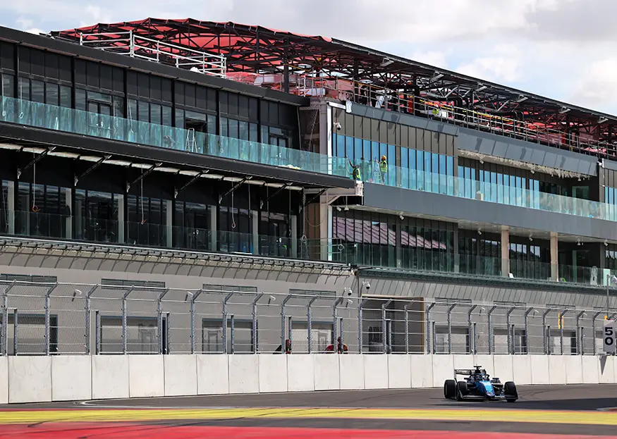 Nicola Lacorte's DAMS Lucas Oil car brakes past the main grandstand at Madring