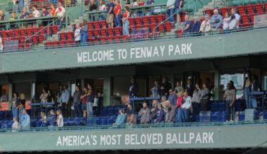 Fans stand for the national anthem at Fenway Park in 2025. (Robert F. Bukaty/AP)