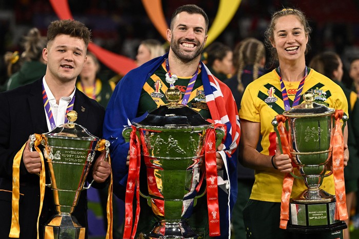 RUGBYL-WC-2021-AUS-SAM-TROPHY Australia are the defending champions of the men's and women's tournament, while England are the holders of the wheelchair tournament.