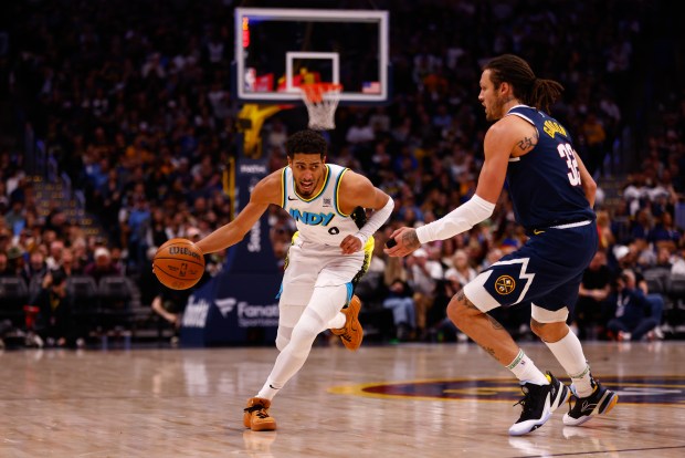 Tyrese Haliburton of the Indiana Pacers drives against Aaron Gordon #32 of the Denver Nuggets during the third quarter at Ball Arena on April 6, 2025 in Denver, Colorado. (Photo by Justin Edmonds/Getty Images)