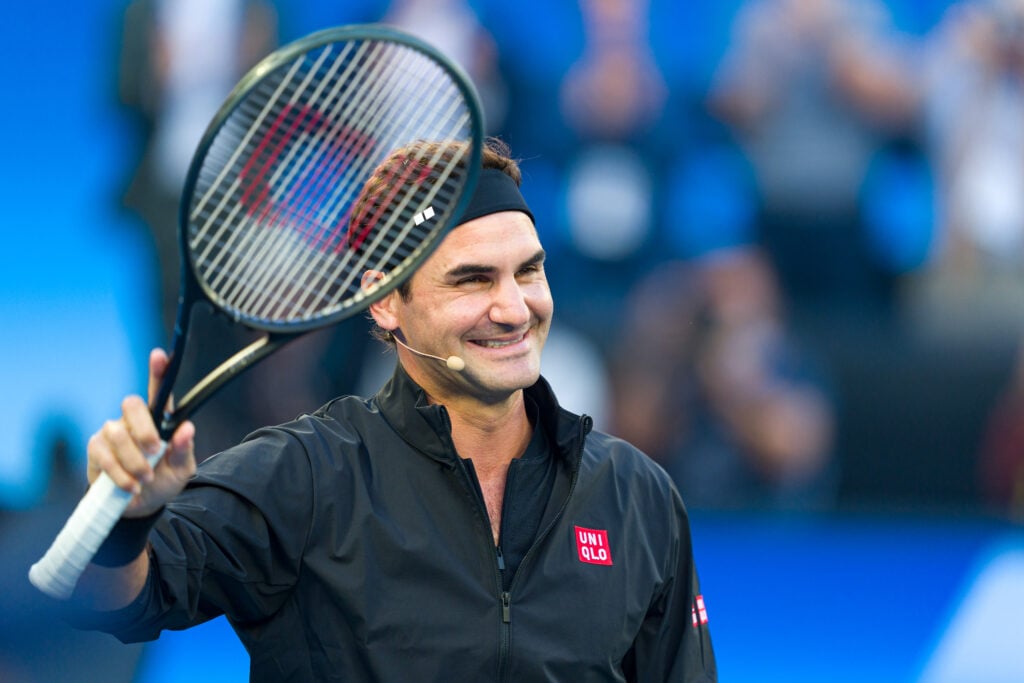 Roger Federer waves to the crowd at the 2026 Australian Open.
