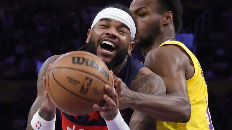Jaden Hardy #8 of the Washington Wizards controls the ball against Bronny James #9 of the Los Angeles Lakers