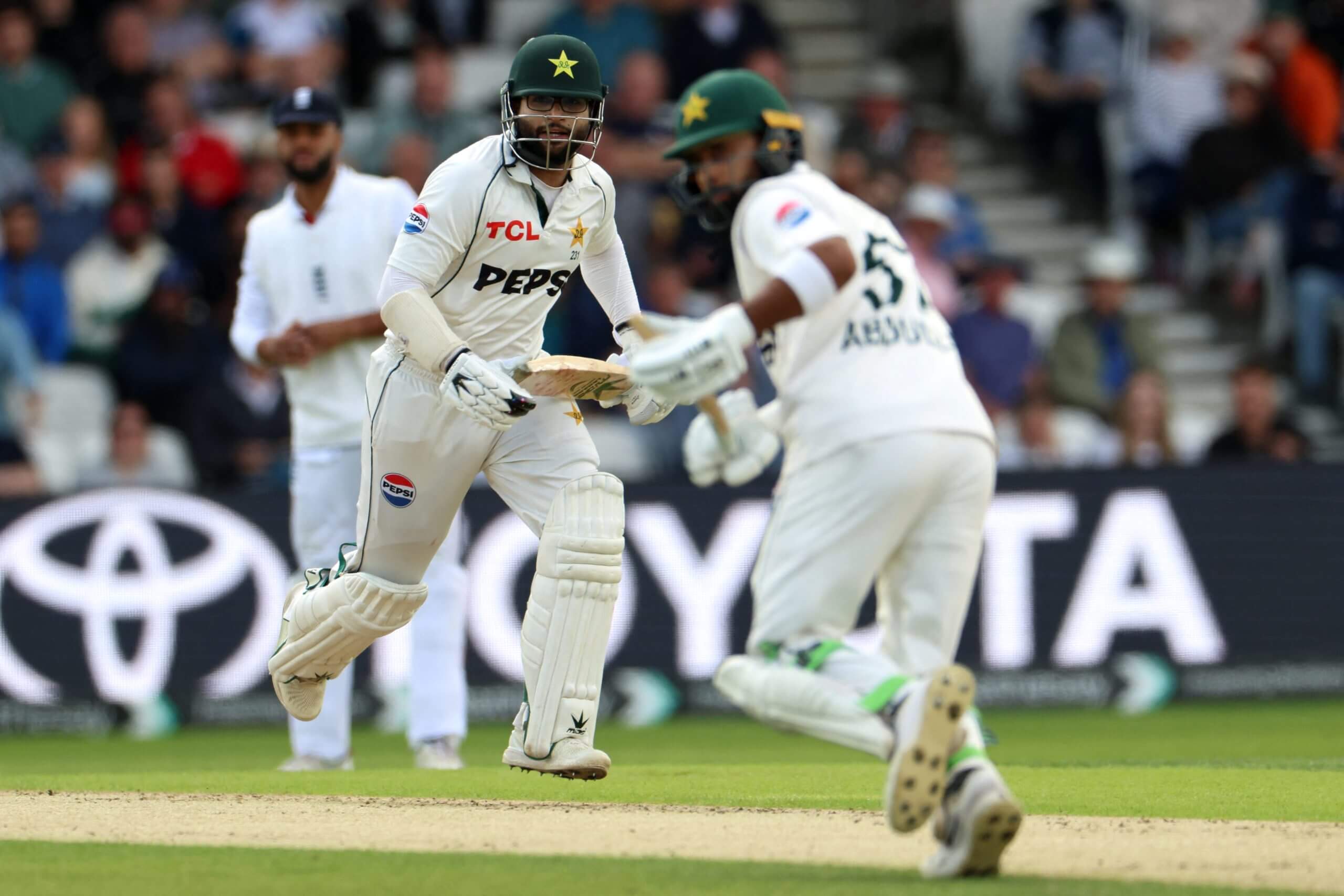 Imam-ul-Haq and Abdullah Shafique running between the wickets