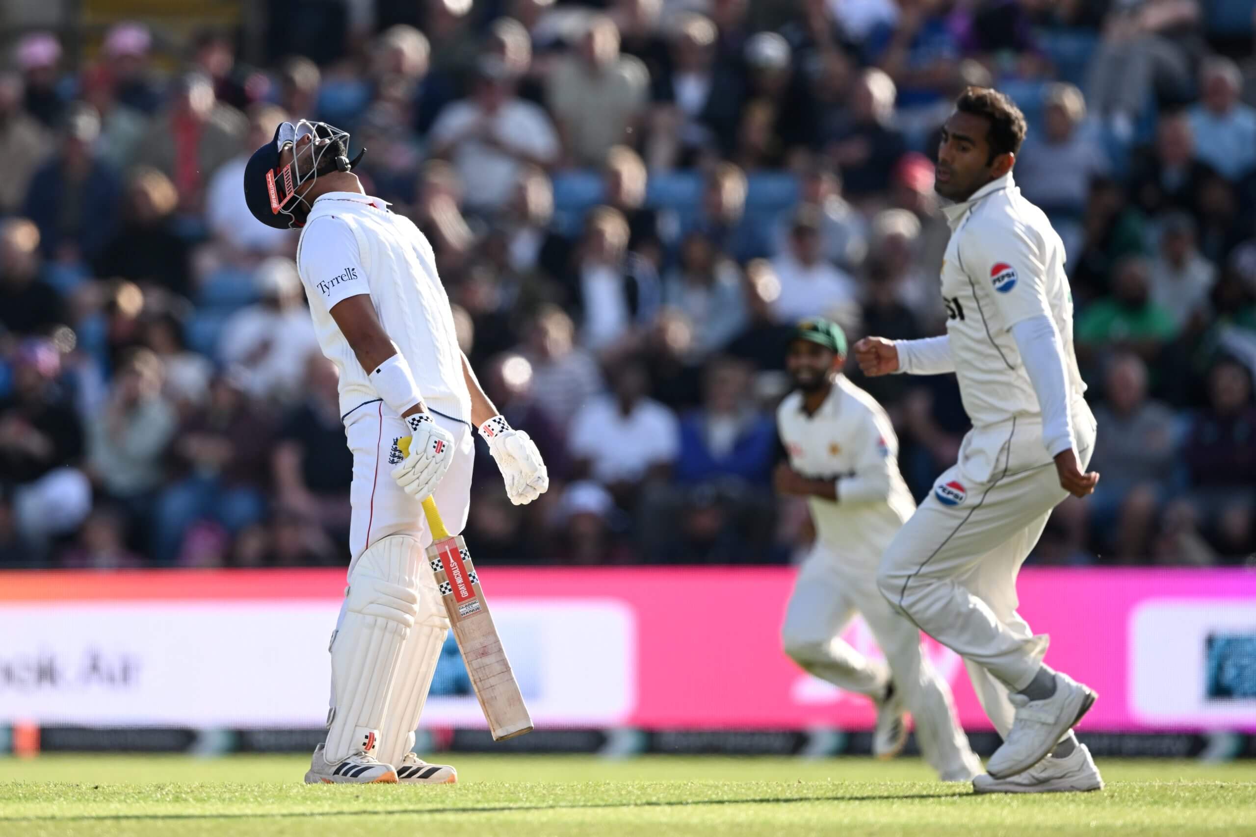 Emilio Gay looks to the heavens as Pakistan celebrate his wicket