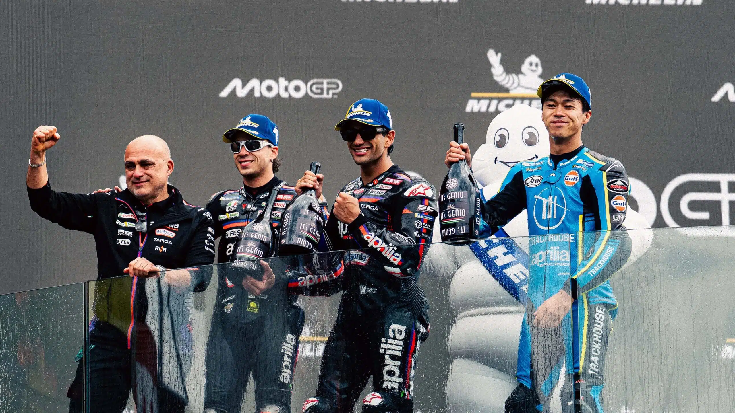 Marco Bezzecchi with Jorge Martin and Ai Ogura on MotoGP podium