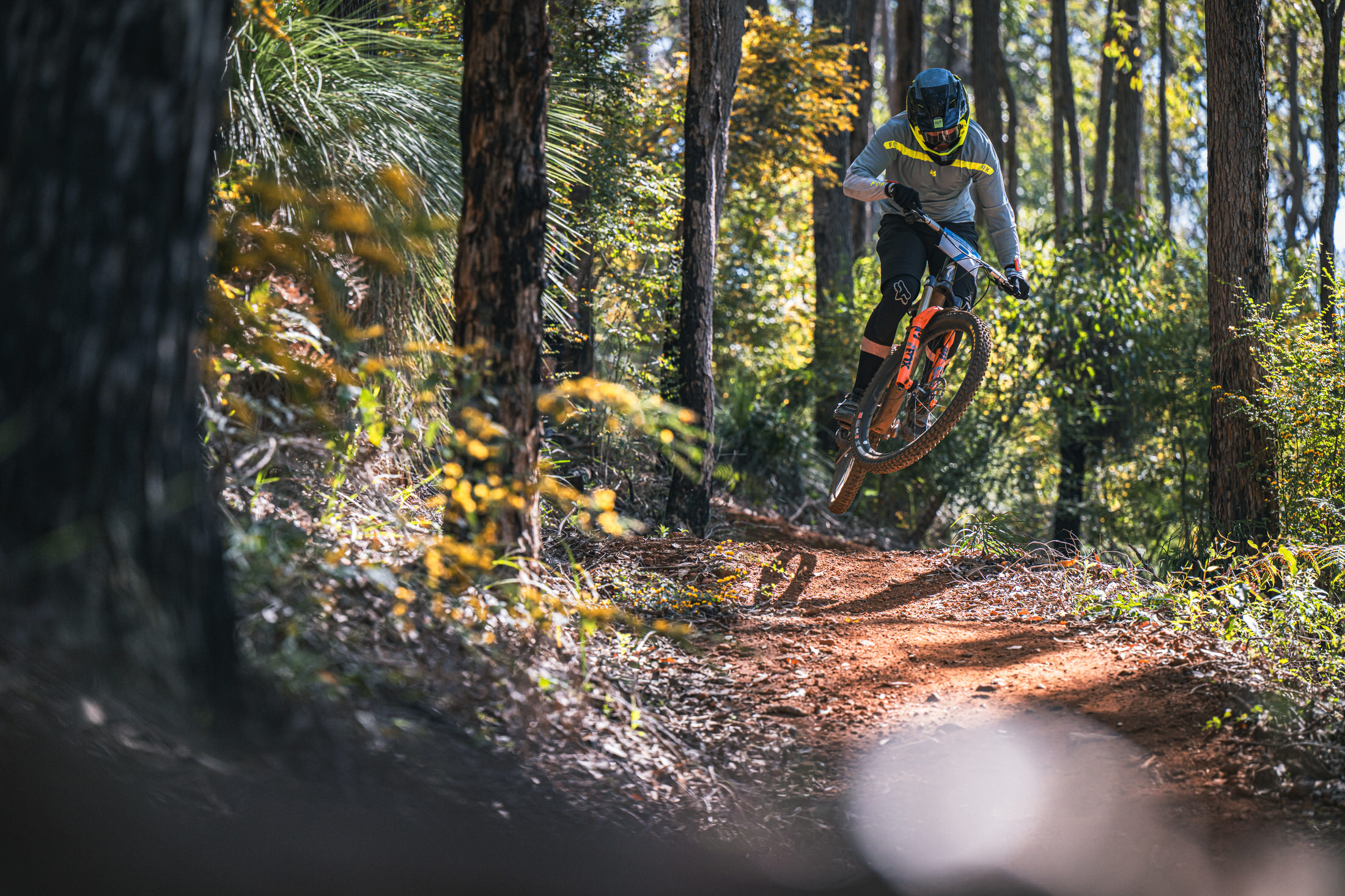A rider hits a jump at the Enduro oceania Championships in Collie, WA