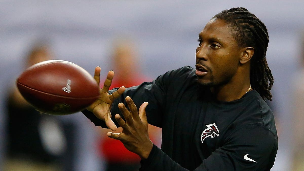 Roddy White warms up before an NFL game