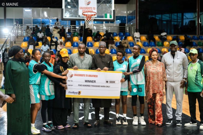 Some of the young female players receive financial support at the end of a tournament organised by Grassroots To Greatness [Grassroots To Greatness]