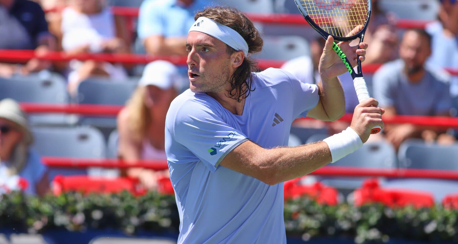 Tsitsipas holds off Brooksby in Winston-Salem opener