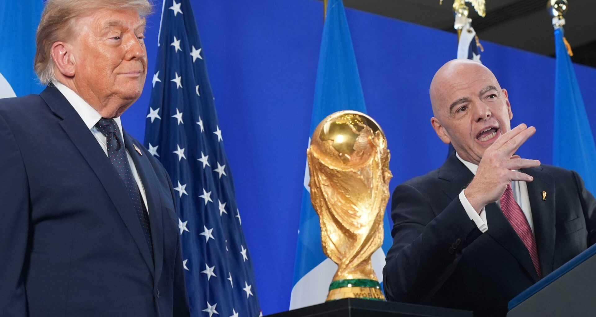 FILE - President Donald Trump listens as FIFA President Gianni Infantino speaks at a reception at Trump Tower in New York, Friday, July 17, 2026. (AP Photo/Jacquelyn Martin)