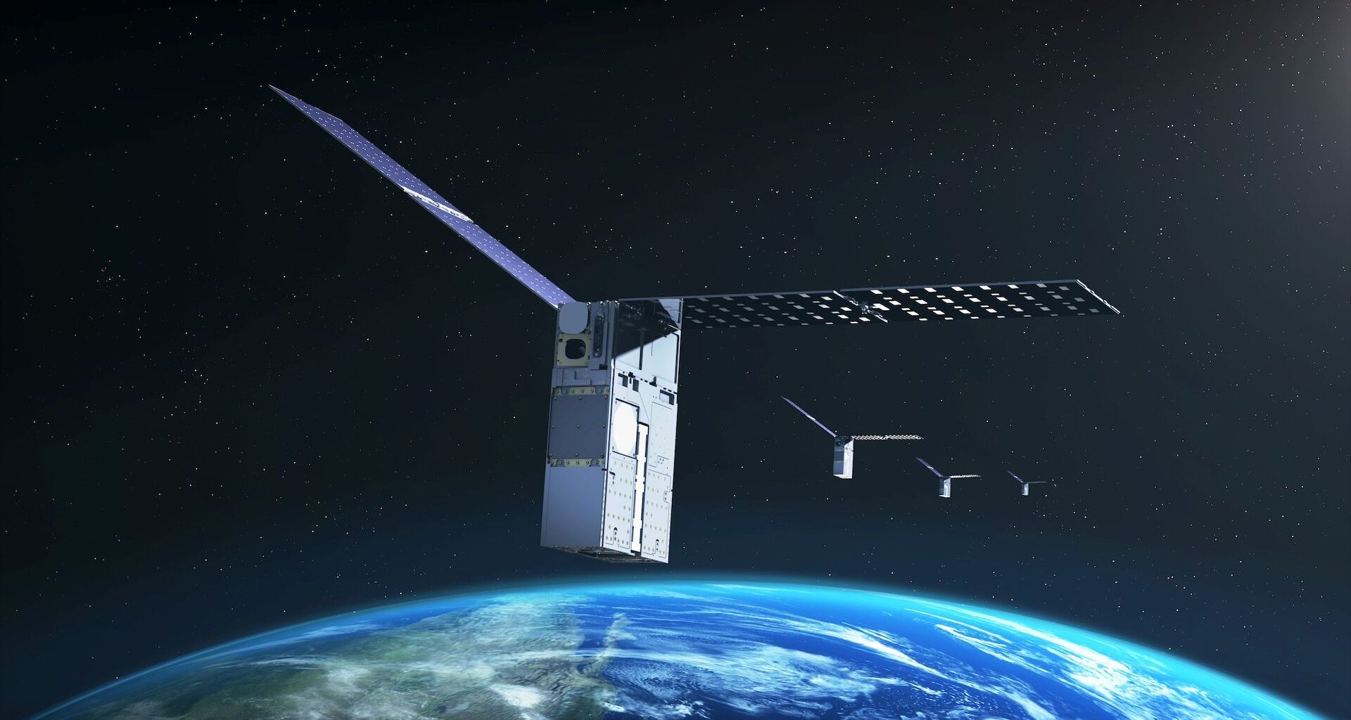 illustration of four small, boxy satellites flying above earth