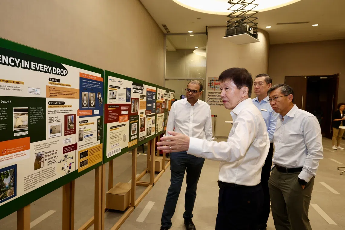 Senior Minister of State for Sustainability and the Environment Janil Puthucheary touring an exhibition at the Sustainability Nexus Forum 2026.