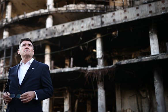 Burnham is shown the rubble at the site of a strike near the Lukanivska market in  Kyiv.