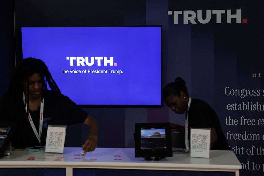 A booth at a state fair showing the Truth Social logo.