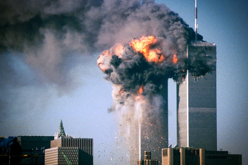 A huge ball of fire and smoke coming from one of the Twin Towers