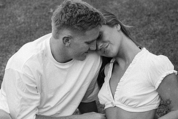 Tom Dearden with his partner Millie Oliver.