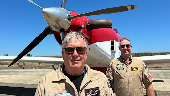 Pilots Carl Marshall (left) and Dave Quinlan (right) in front of an Air Tractor aircraft from Australian company Aerotech. They are part of a multinational group fighting fires for French authorities from a military base near Bordeaux.