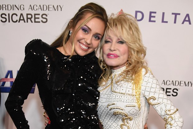 Miley Cyrus and godmother Dolly Parton