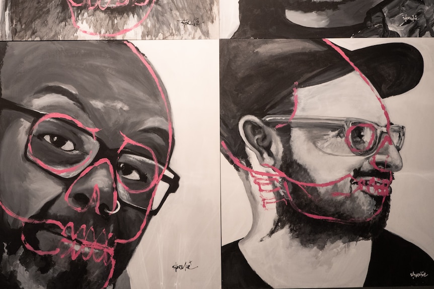 Portraits of artists in a gallery. Both are men with glasses