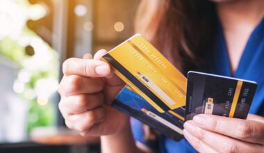 woman holding credit cards