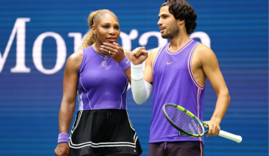 NEW YORK, NEW YORK - AUGUST 25: Carlos Alcaraz of Spain interacts with Serena Williams of the United States in their mixed doubles match against Erin Routliffe of New Zealand and Lloyd Glasspool of the United Kingdom during Fan Week at the USTA Billie Jean King National Tennis Center on August 25, 2026 in the Flushing neighborhood of the Queens borough of New York City. (Photo by Sarah Stier/Getty Images)