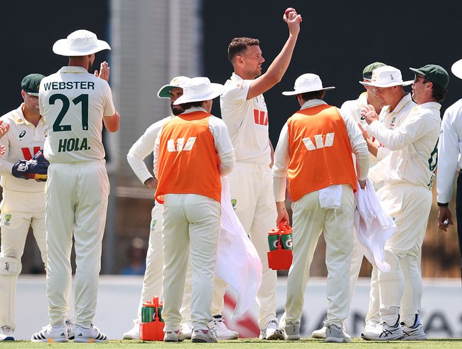 Josh Hazlewood  celebrates after taking the wicket of Taijul Islam, his 300th Test wicket as well his fifth wicket for the innings.