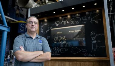 Tom Percy, manager of systems engineering and integration for NASA’s Human Landing Systems Program, stands in front of an Apollo Program lander exhibit at the U.S. Space and Rocket Center in Huntsville near NASA’s Marshall Space Flight Center.