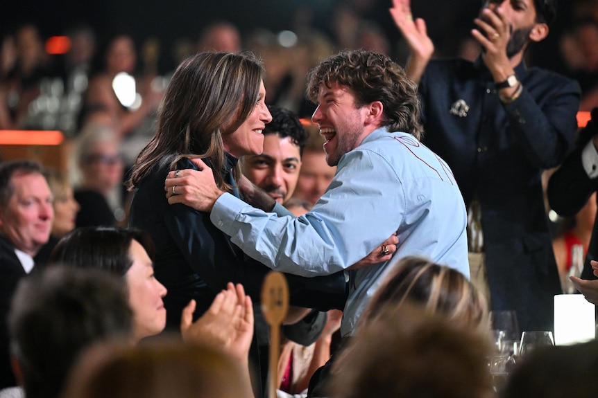 Claudia Karvan accepts the Silver Logie Award for Best Supporting Actress for Homebodies with co-star Luke Wiltshire.
