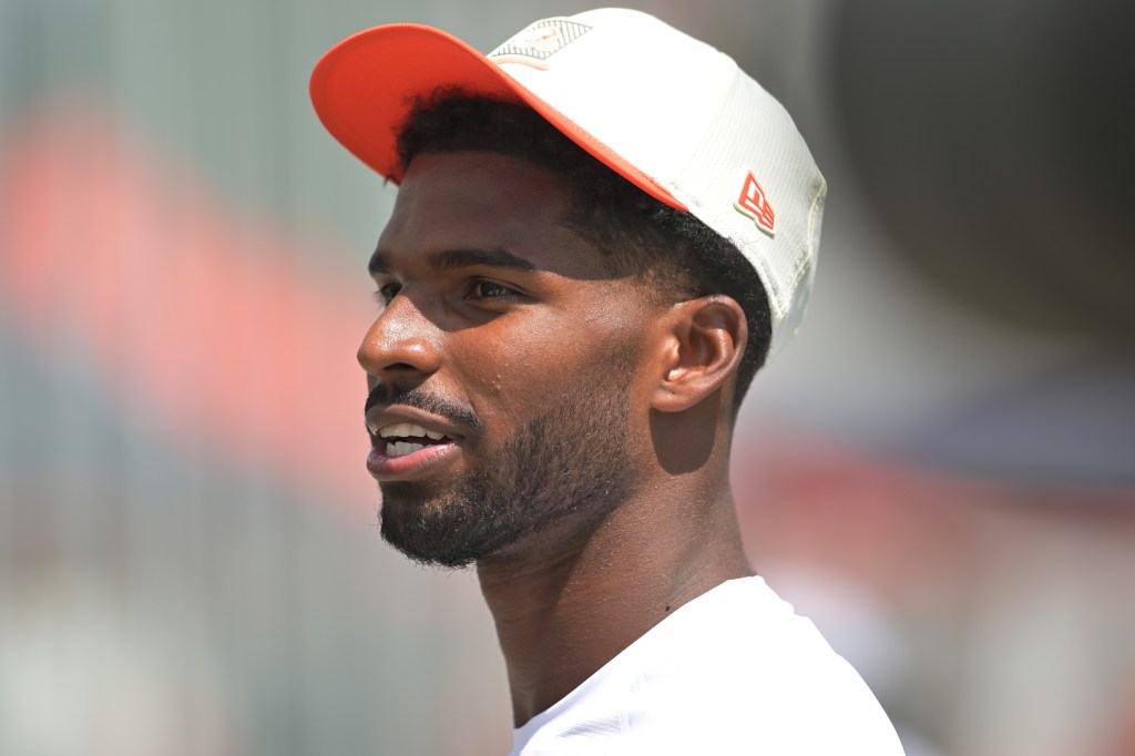 Cleveland Browns quarterback Shedeur Sanders (2) in a white hat with an orange brim.