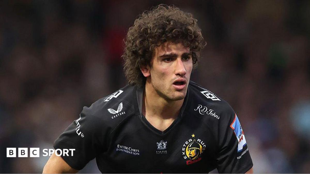 Andrea Zambonin torso and head shot looking forward, focused, wearing black Exeter Chiefs home kit