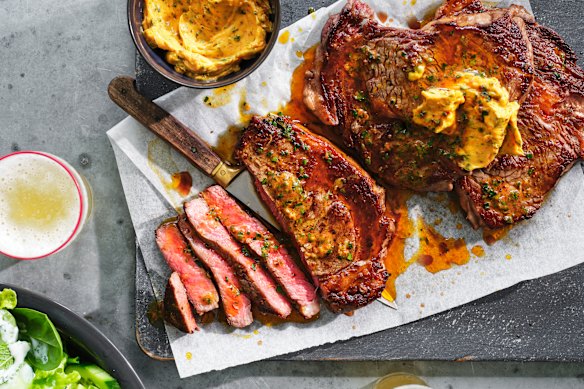 Rib-eye steaks with hot butter.