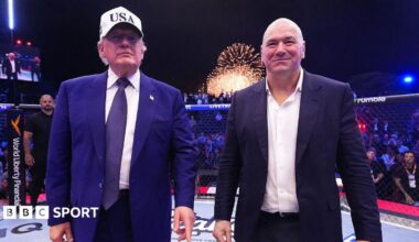 US president Donald Trump stands next to UFC president Dana White