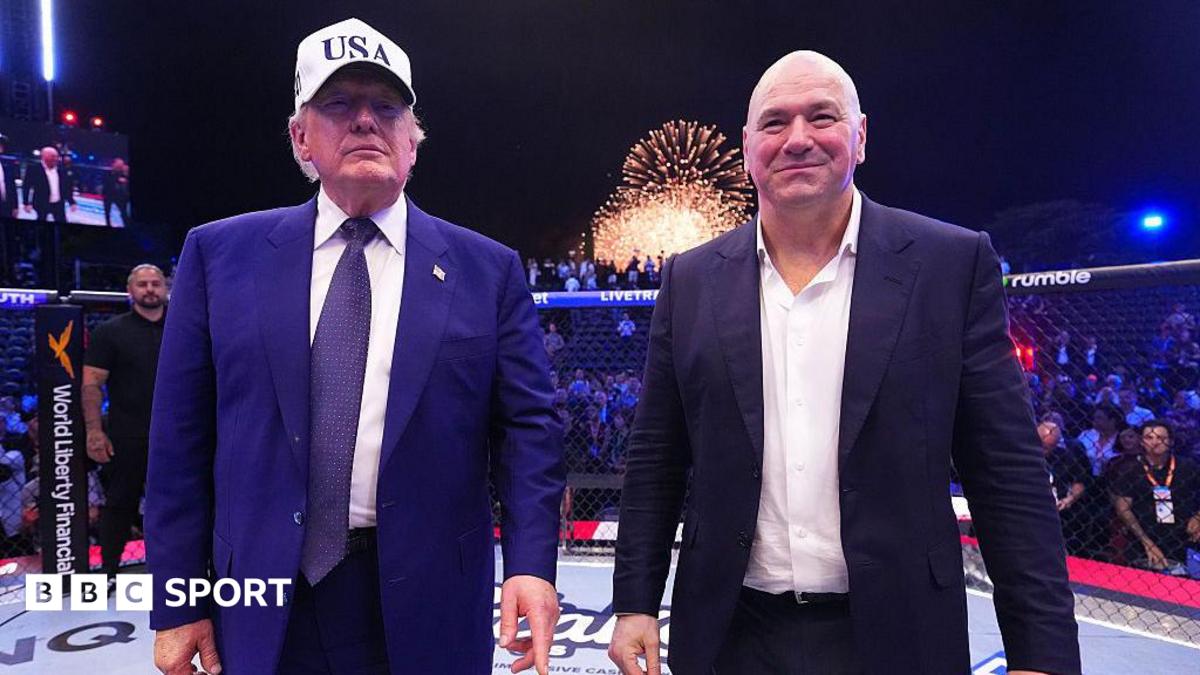 US president Donald Trump stands next to UFC president Dana White