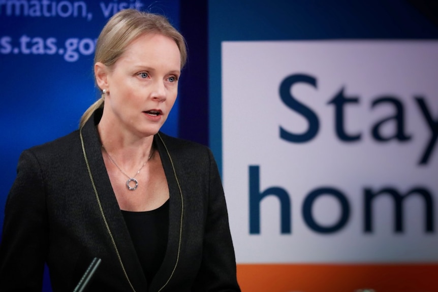 Health Minister Sarah Courtney speaks at a media conference.