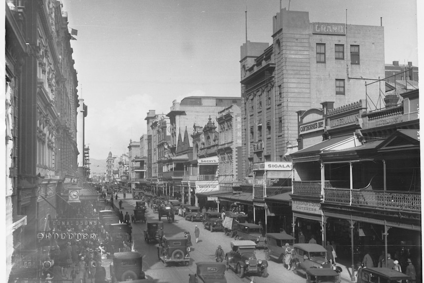 A black and white image of buildings and Rundle Street shopping precinct in 1920s and 30s