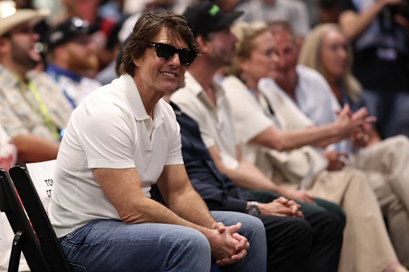 Tom Cruise attends the drivers meeting before a race at Daytona last week.