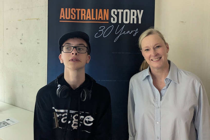 Hayden Eastbury standing next to Leigh Sales