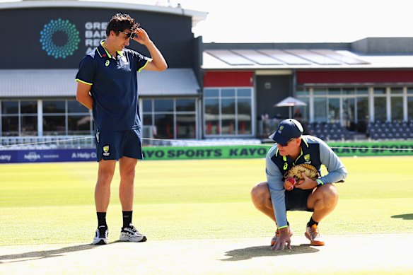 Australian captain Pat Cummins and coach Andrew McDonald take a close look at the pitch in Mackay and consider their selection options  ahead of the Test against Bangladesh.