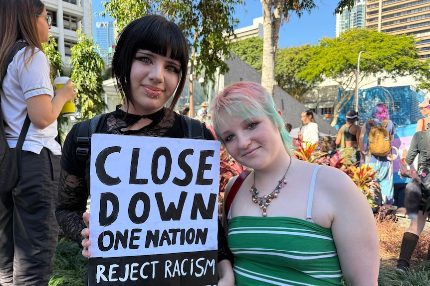 Two teenage girls at a protest
