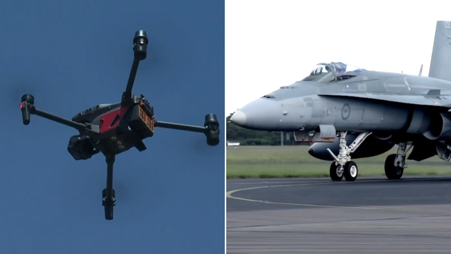 Multiple drones were recorded flying in restricted airspace over a highly-sensitive air force base.