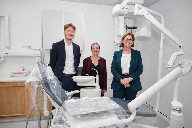 Uniting smiles chair and dentist Sean Archibald, Palmerston CEO Emma Jarvis, and Health Minister Meredith Hammat.