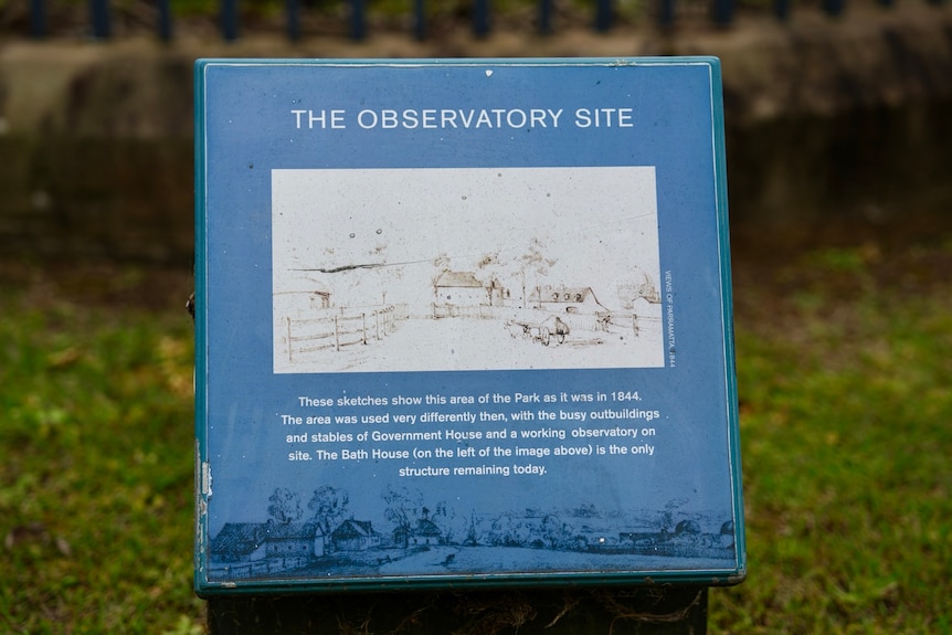 Parramatta Observatory site with the remnants of the obelisk on a cloudy day in a park.