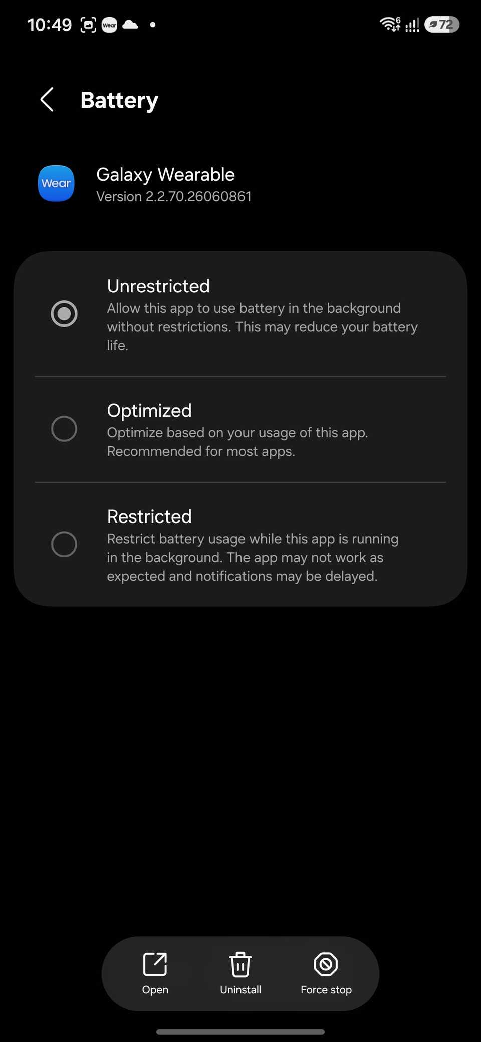 Galaxy Wearable battery settings with Unrestricted selected over Optimized and Restricted.